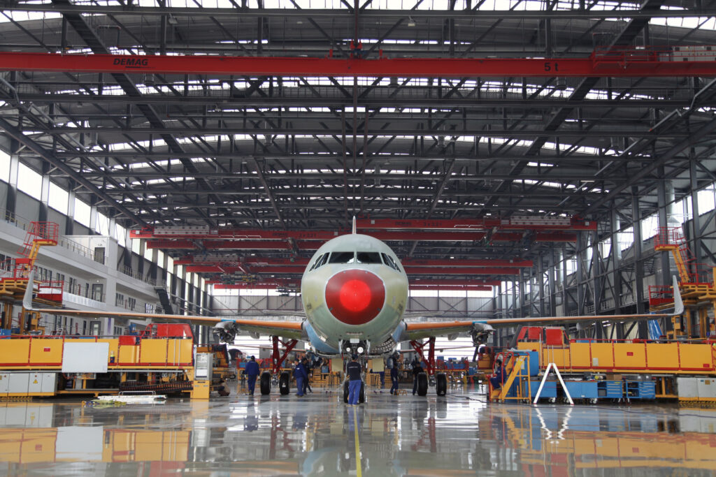 Airbus is coping with supply chain challenges around the globe. Pictured is an Airbus A320 in final assembly at the assembly line in Tianjin. (Photo Credit: Airbus)